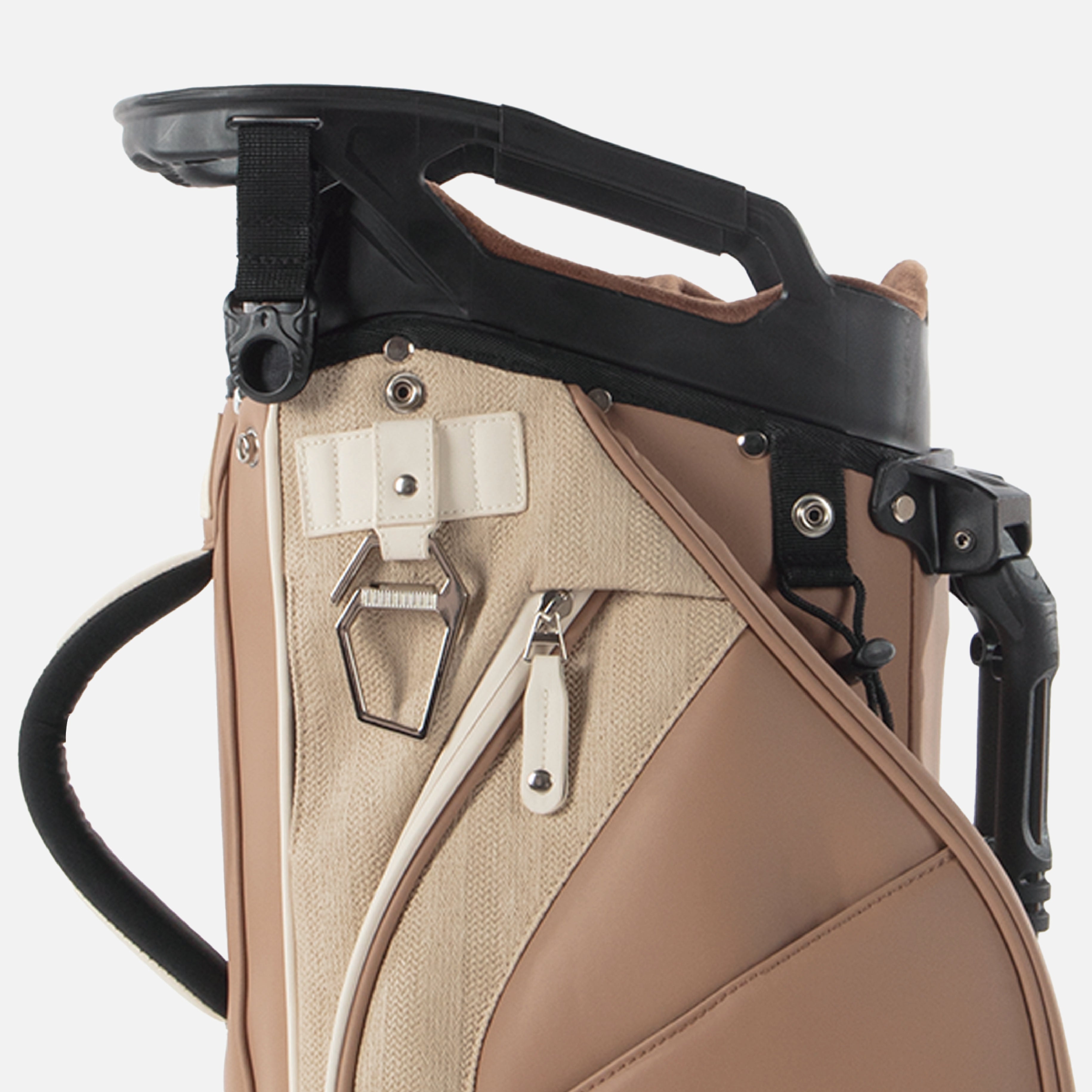 Secure cart strap channel keeps the bag firmly in place. The metal towel ring holds your towel — and easily opens a cold beer after the round.