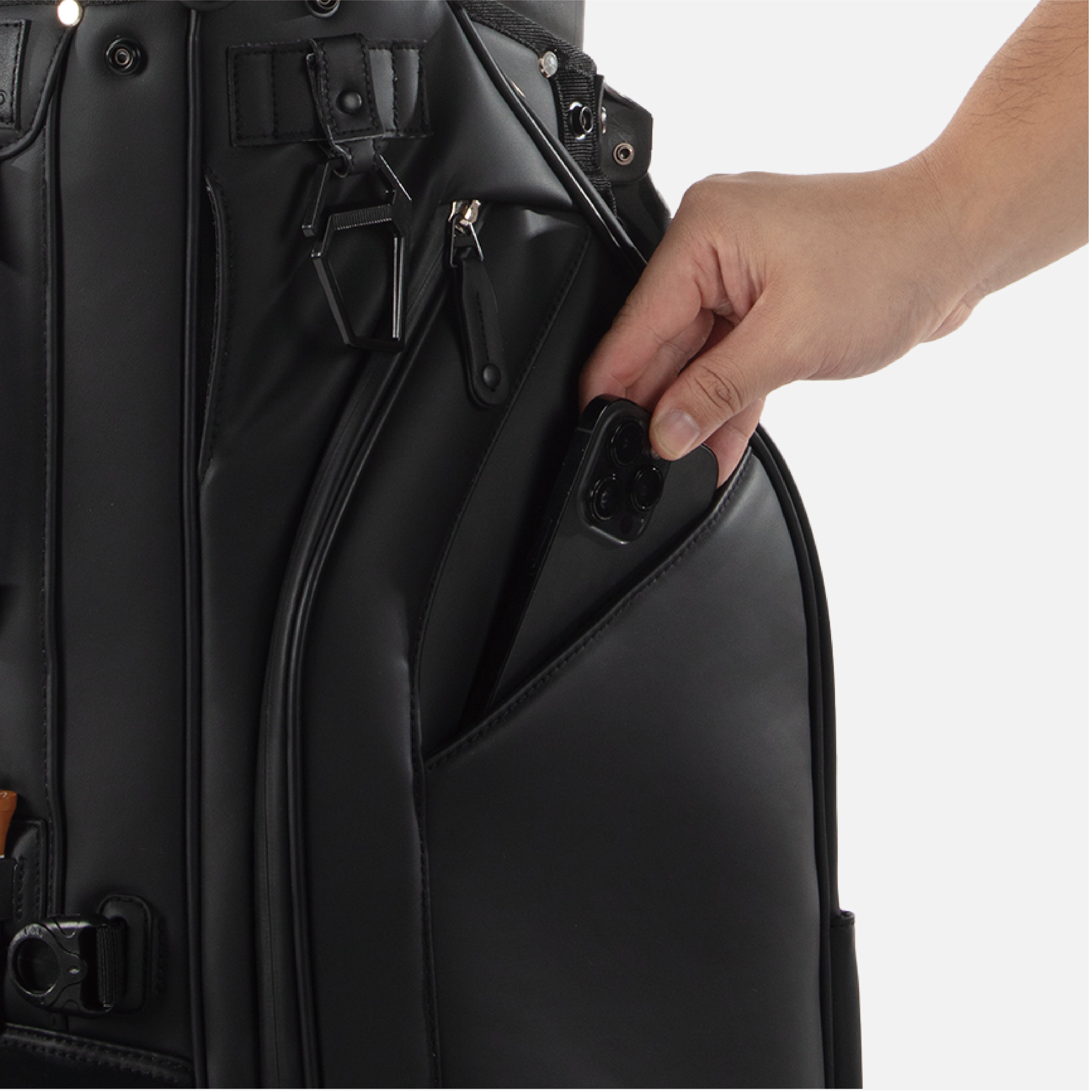 Discreet magnetic pockets offer fast, silent access to essentials with a refined, minimalist feel.