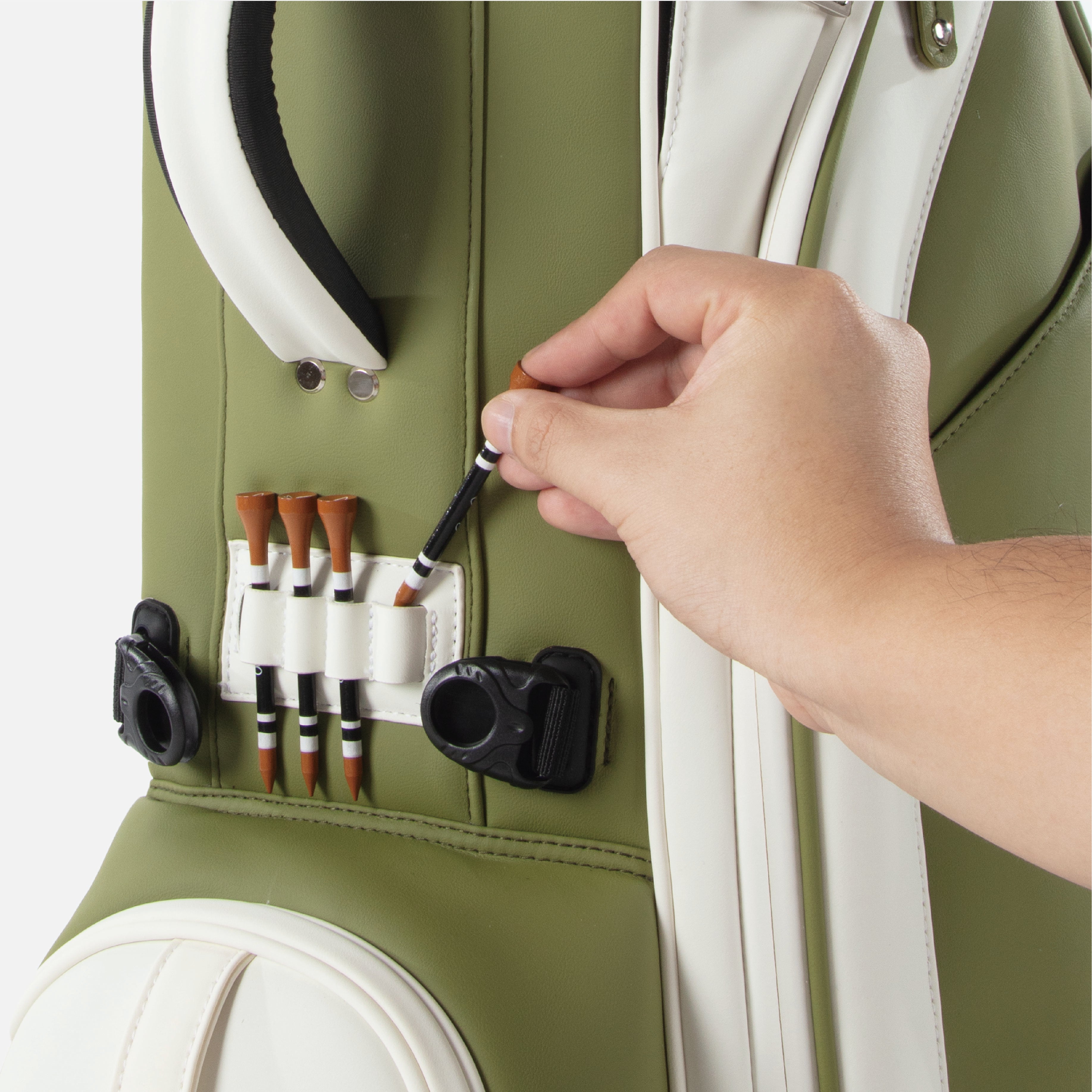 Clean, built-in tee holder designed for effortless access on the course.